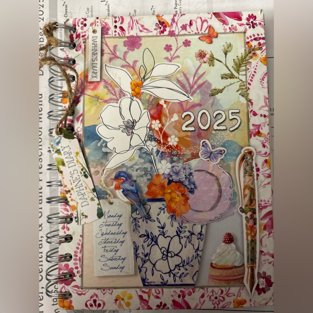 Floral 2025 Planner with Blue and Orange Accents